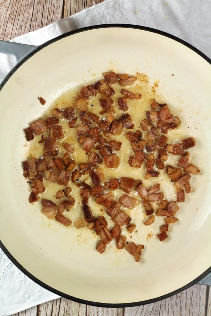 cubed pancetta sautéed in skillet