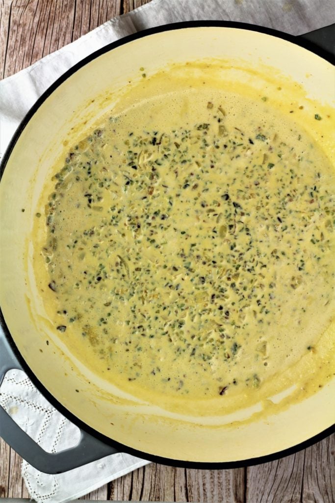 large skillet with creamy pistachio sauce