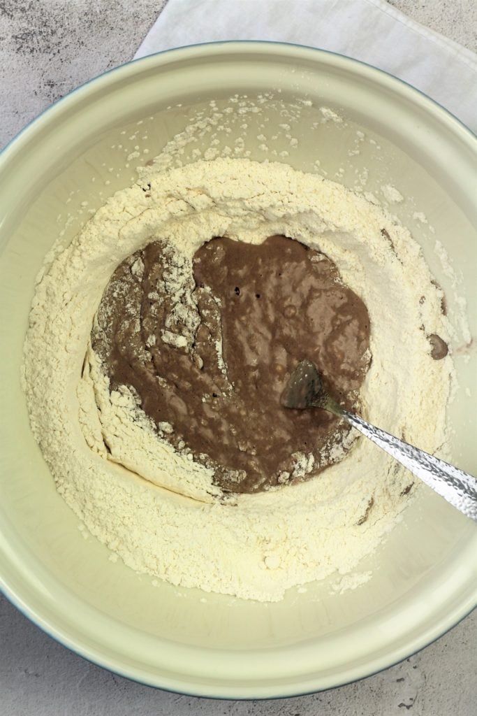 dough with red wine stirred with fork in large bowl