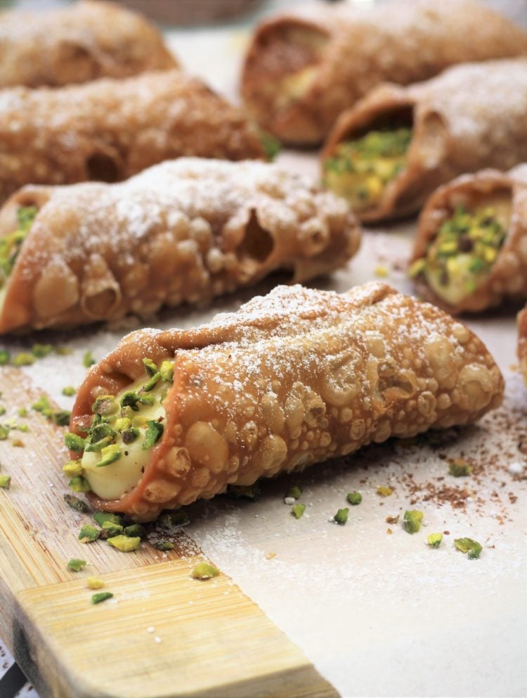 pistachio topped pastry cream filled cannoli