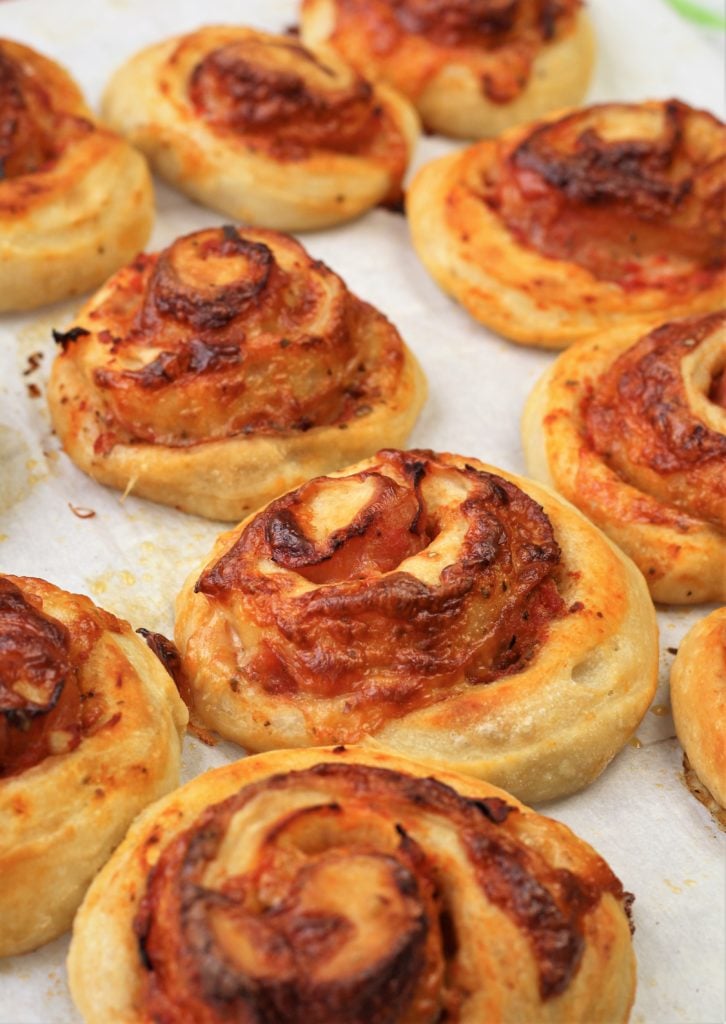 pizza rolls baked on baking sheet 