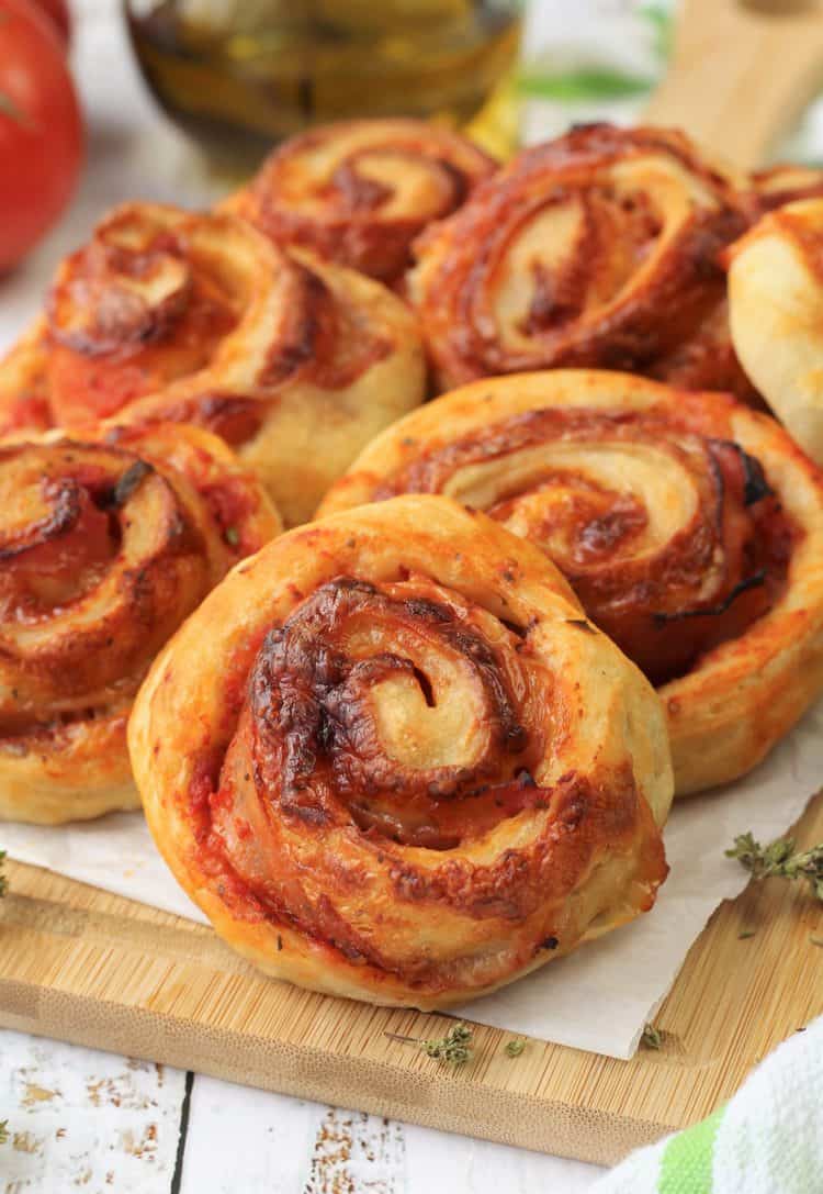 homemade pizza rolls on wood board