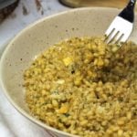 bowl of barley risotto with forkful