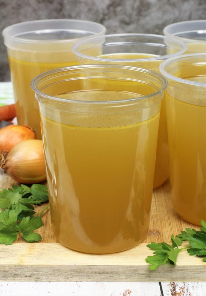 1 liter plastic containers filled with chicken broth