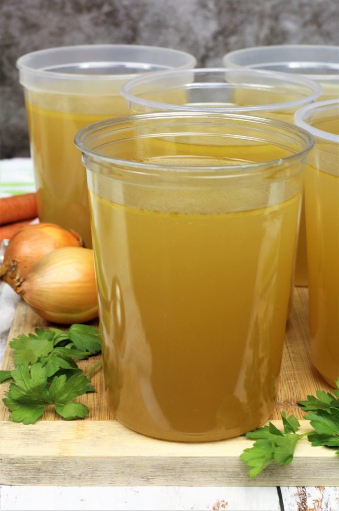 1 liter plastic containers filled with homemade chicken broth 