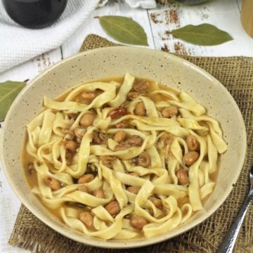 bowl of noodles with beans