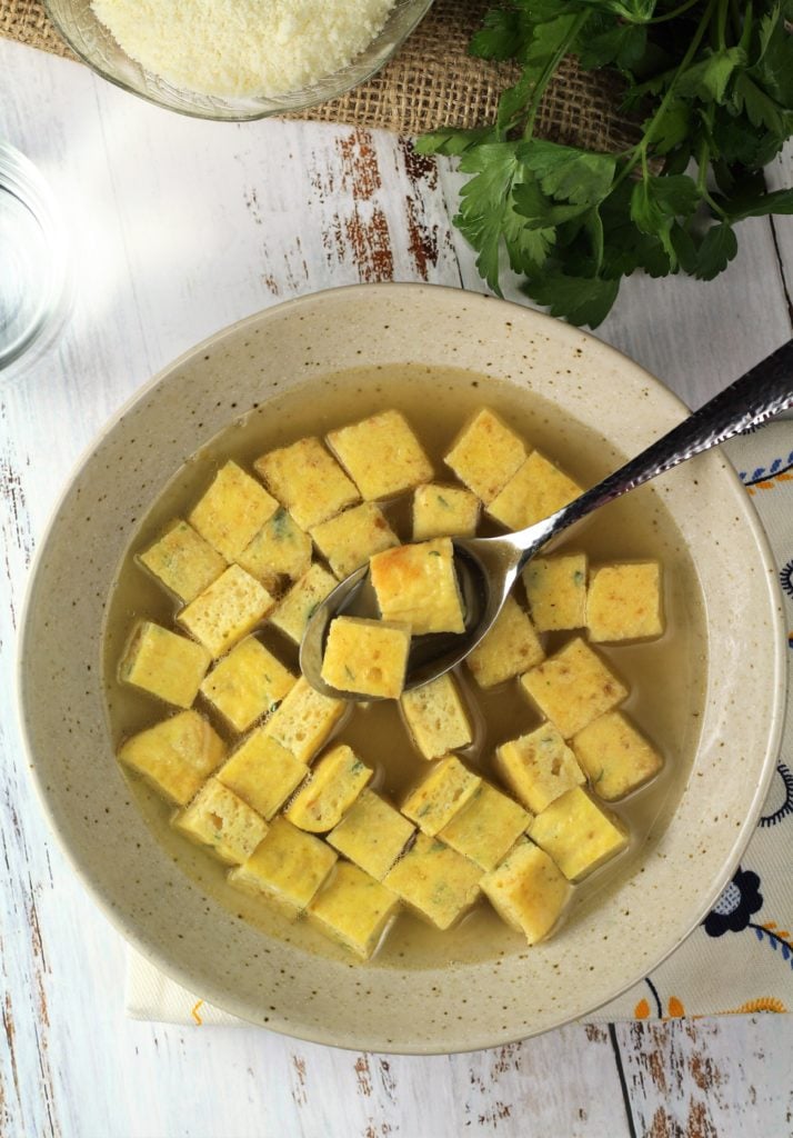 overhead view of bowl of imperial soup with spoonful