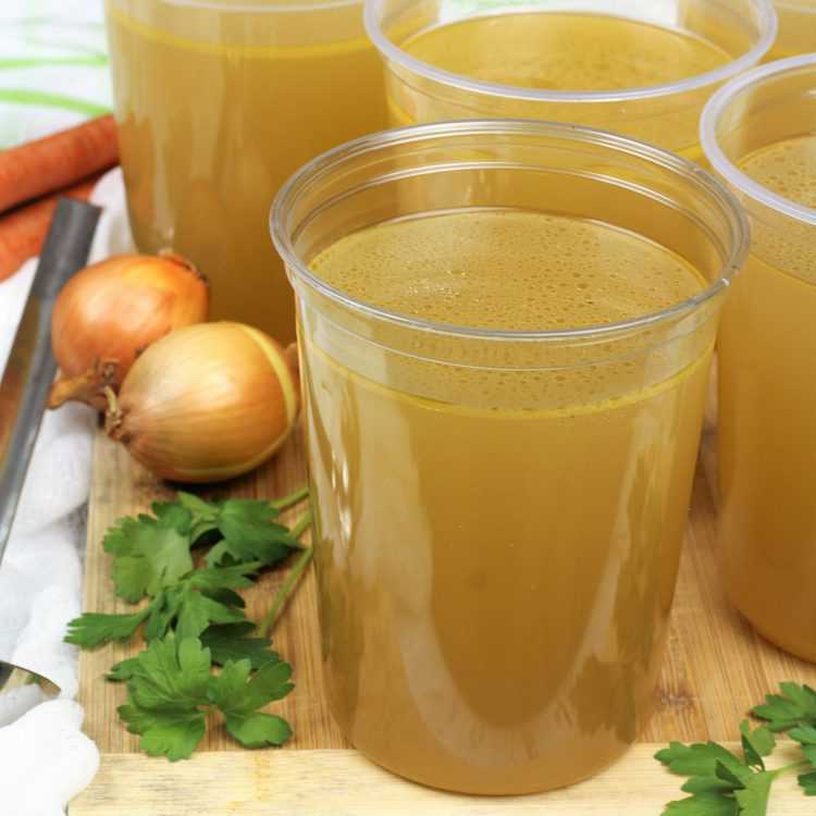 homemade chicken broth in one liter plastic containers