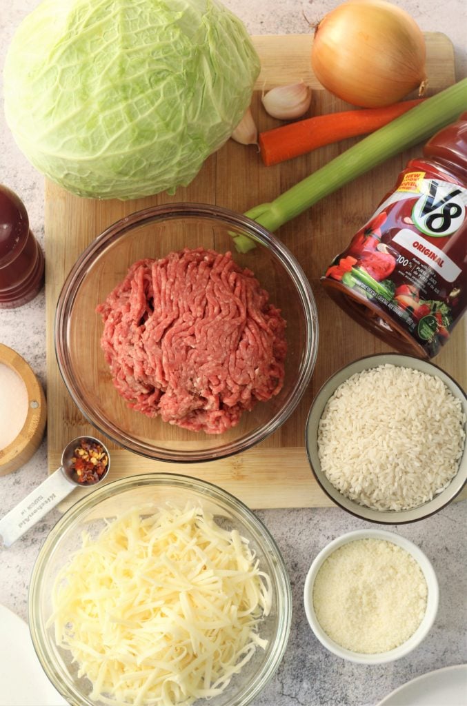 ingredients for cabbage roll casserole on wood board