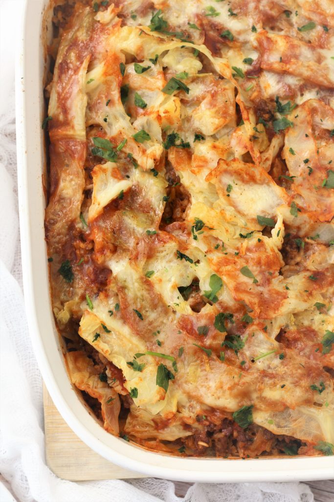 closeup of cabbage roll casserole in white baking dish