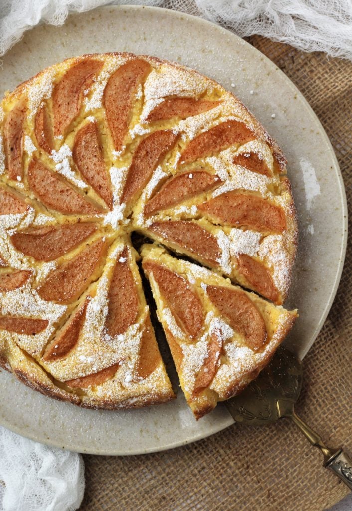 pear-ricotta-cheesecake-wedge-cut-with-spatula