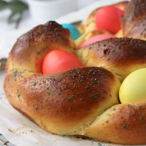 Italian braided Easter bread with colored eggs.