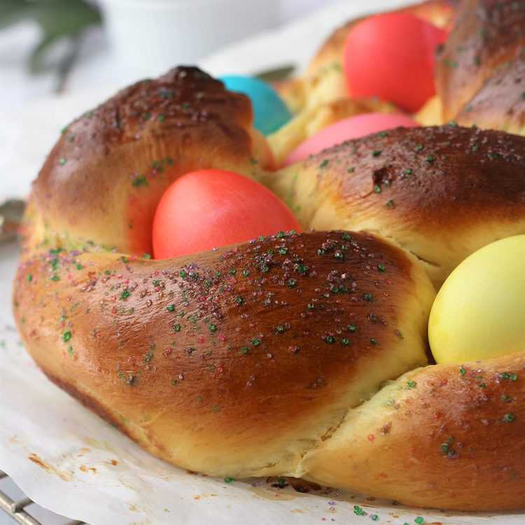 Braided sweet Italian Easter bread with colored eggs.