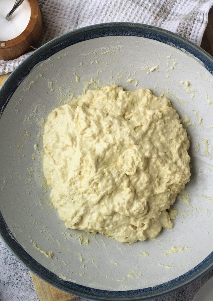 No knead dough for focaccia in bowl.