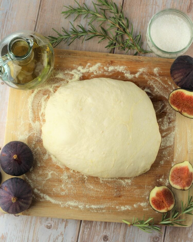 Pizza dough, fresh figs, rosemary sprigs and olive oil.