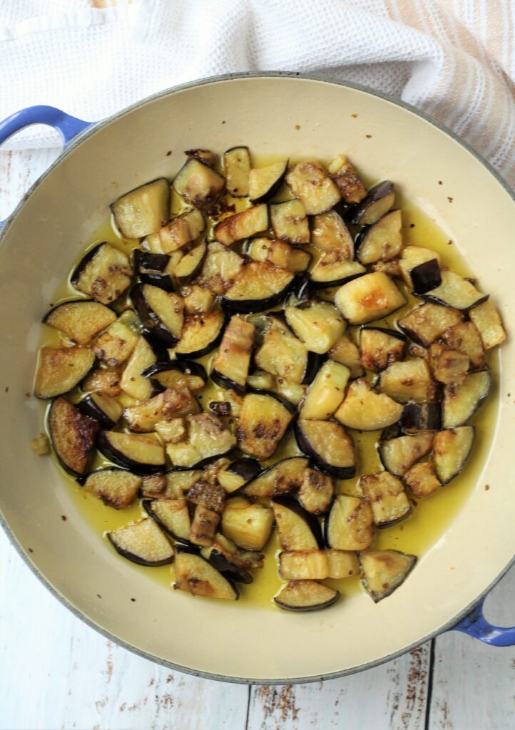 Sautéd eggplant cubes in oil in skillet.