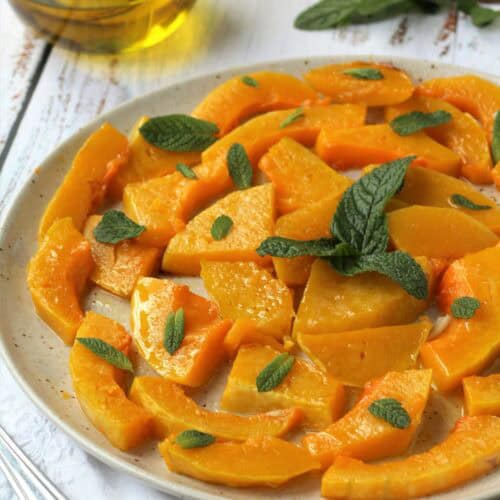 Sicilian sweet and sour squash with mint on plate.