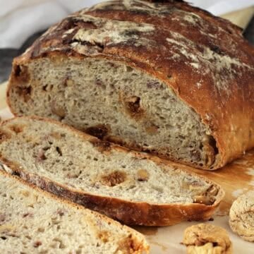 No knead fig and walnut bread sliced open.
