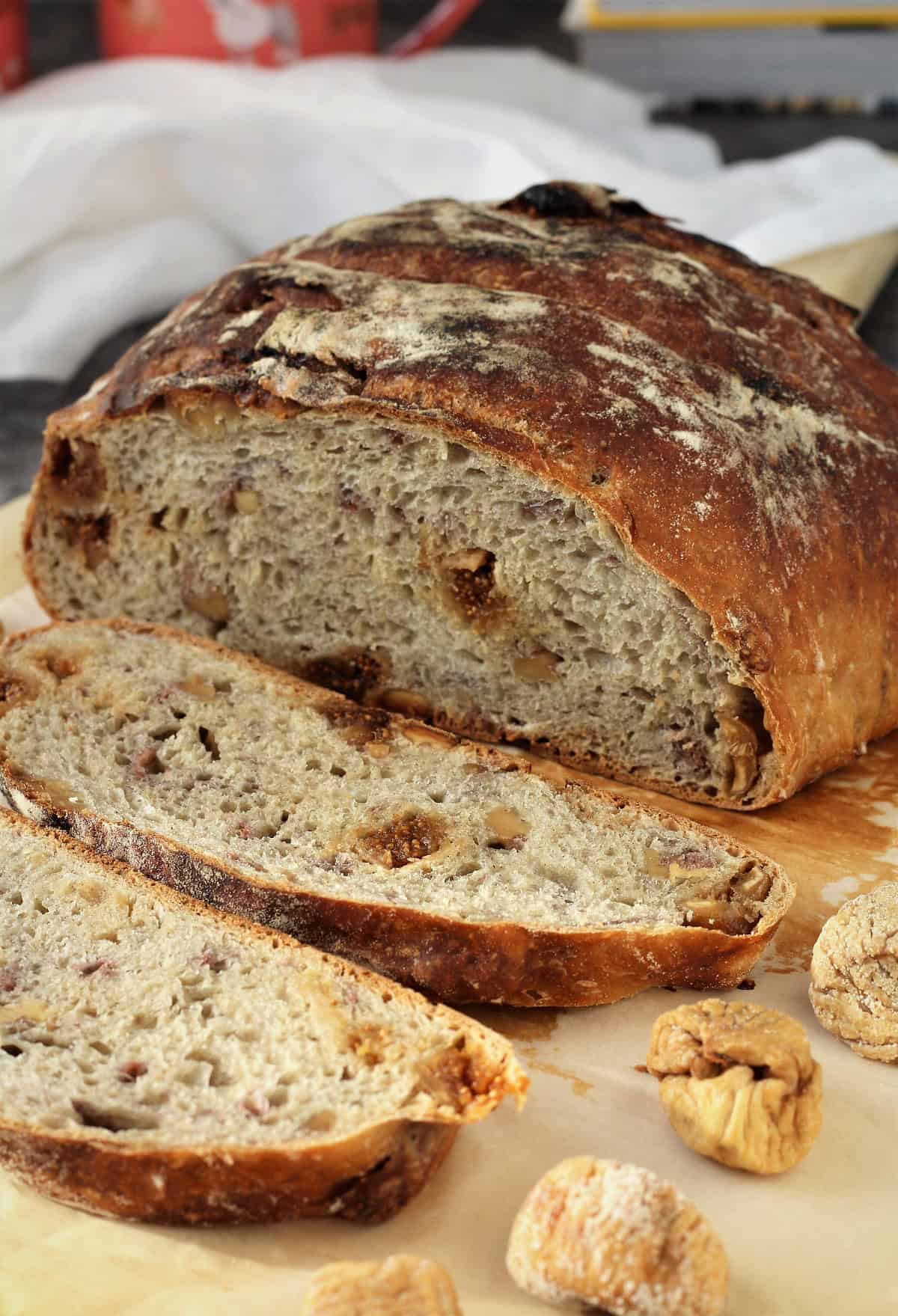 No knead fig and walnut bread sliced open.