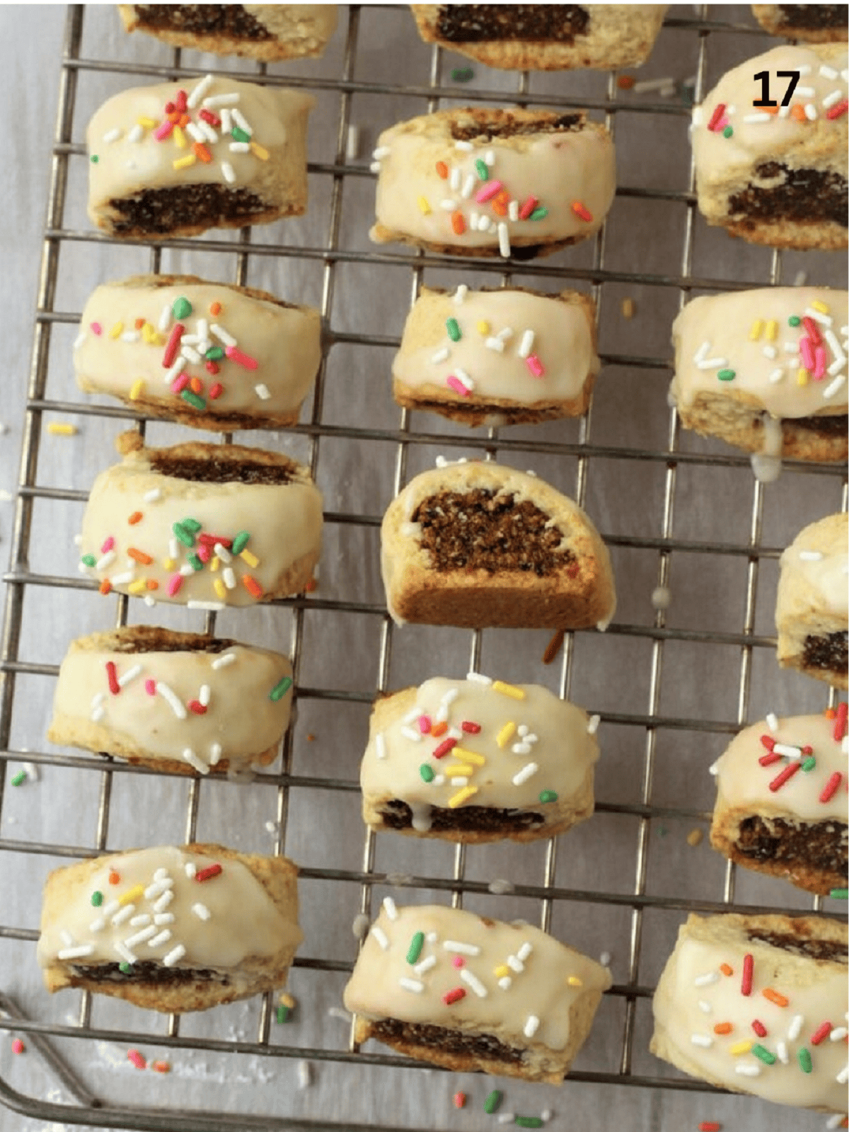 Glazed and decorated cuccidati on wire rack.