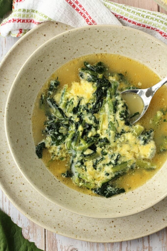 Italian chicory soup with eggs and cheese.