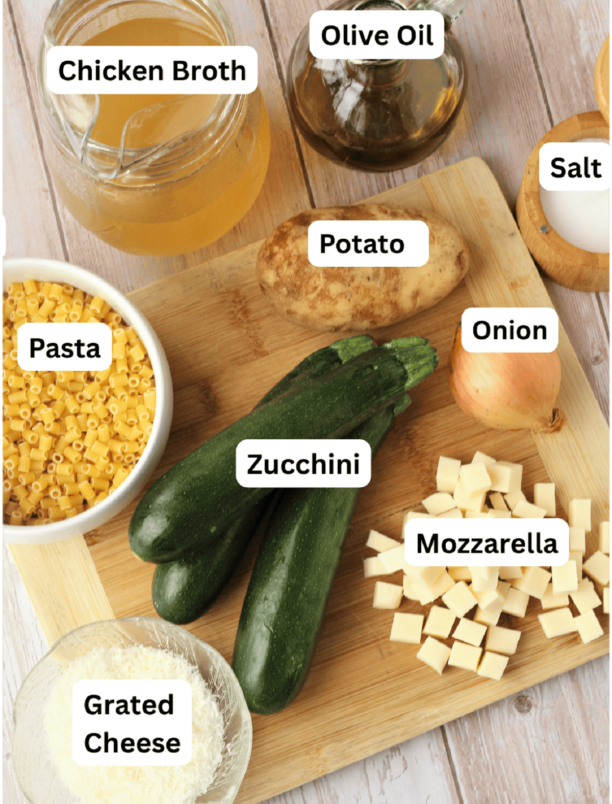 Zucchini, mozzarella, onion, salt, olive oil, chicken broth, pasta and grated cheese.