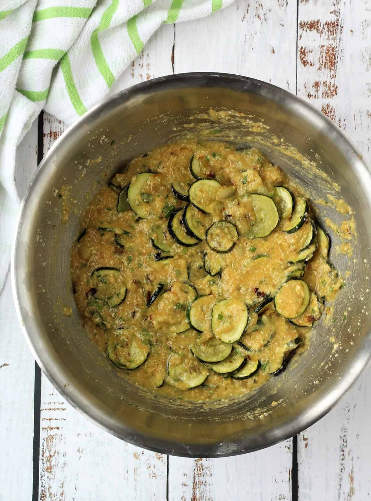 Zucchini frittata mixture in large bowl.