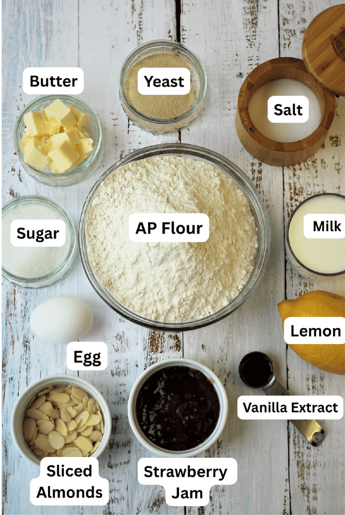 Flour, salt, sugar, yeast, lemon, almonds, jam, vanilla extract, egg, butter and milk.