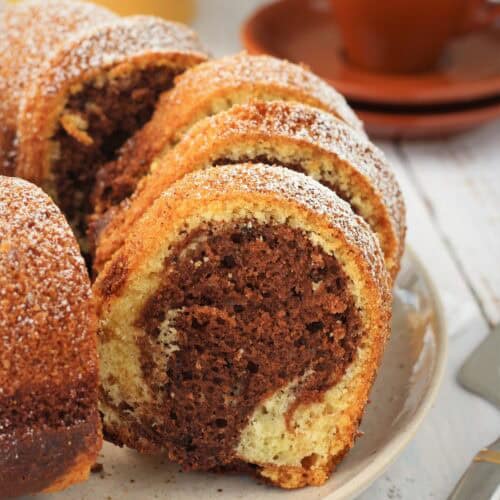 Italian chocolate marble cake sliced on plate.