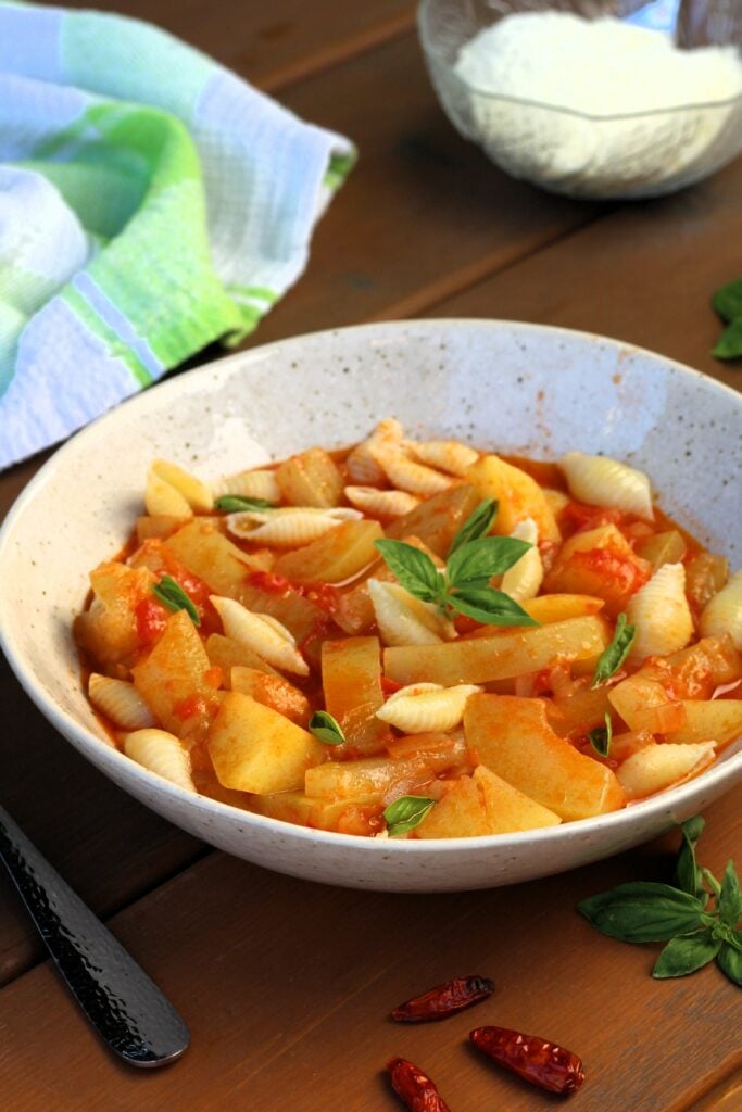 Cucuzza soup with potatoes, tomatoes and pasta in bowl.