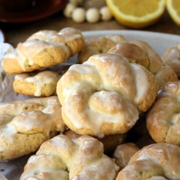 Anise lemon glazed taralli on serving plate.