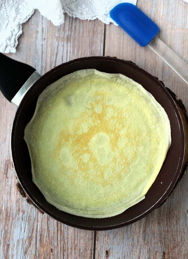 Crepe in non-stick pan.