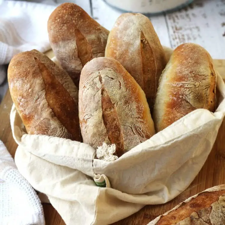 Italian panini bread in cloth bread bag.