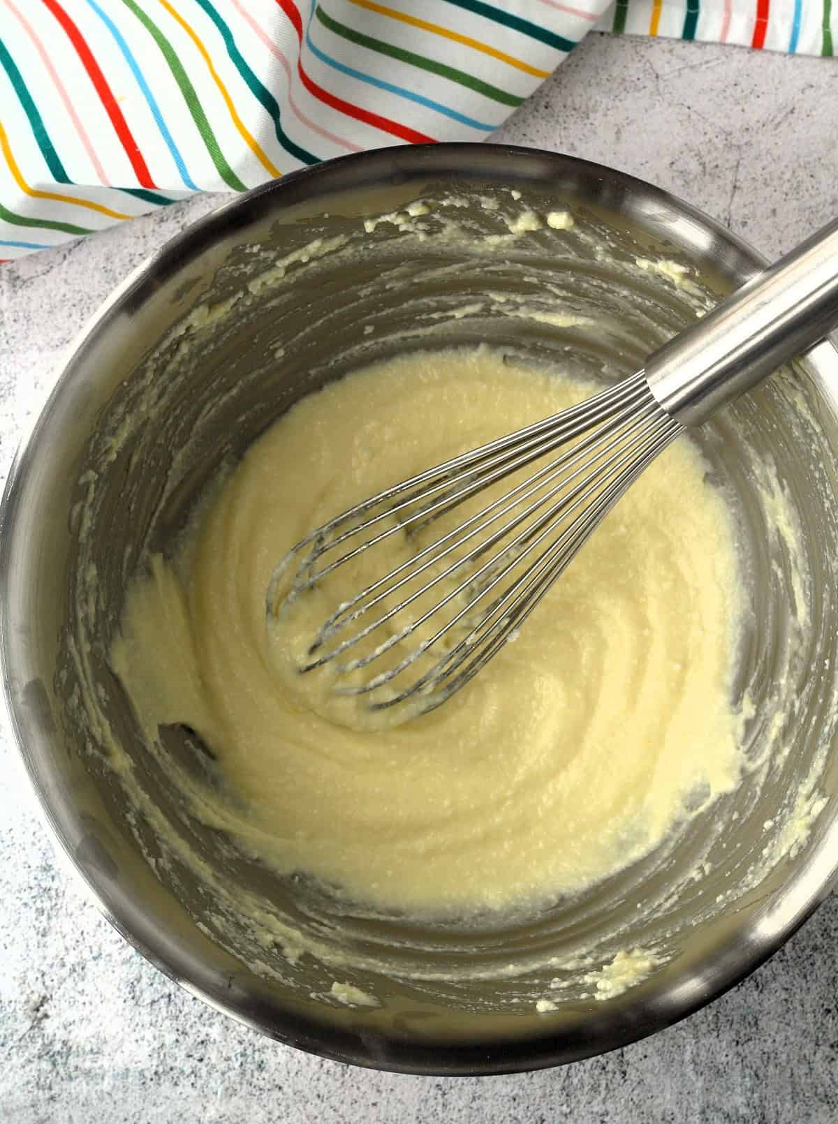 Whisked ricotta, egg, sugar and butter in mixing bowl.