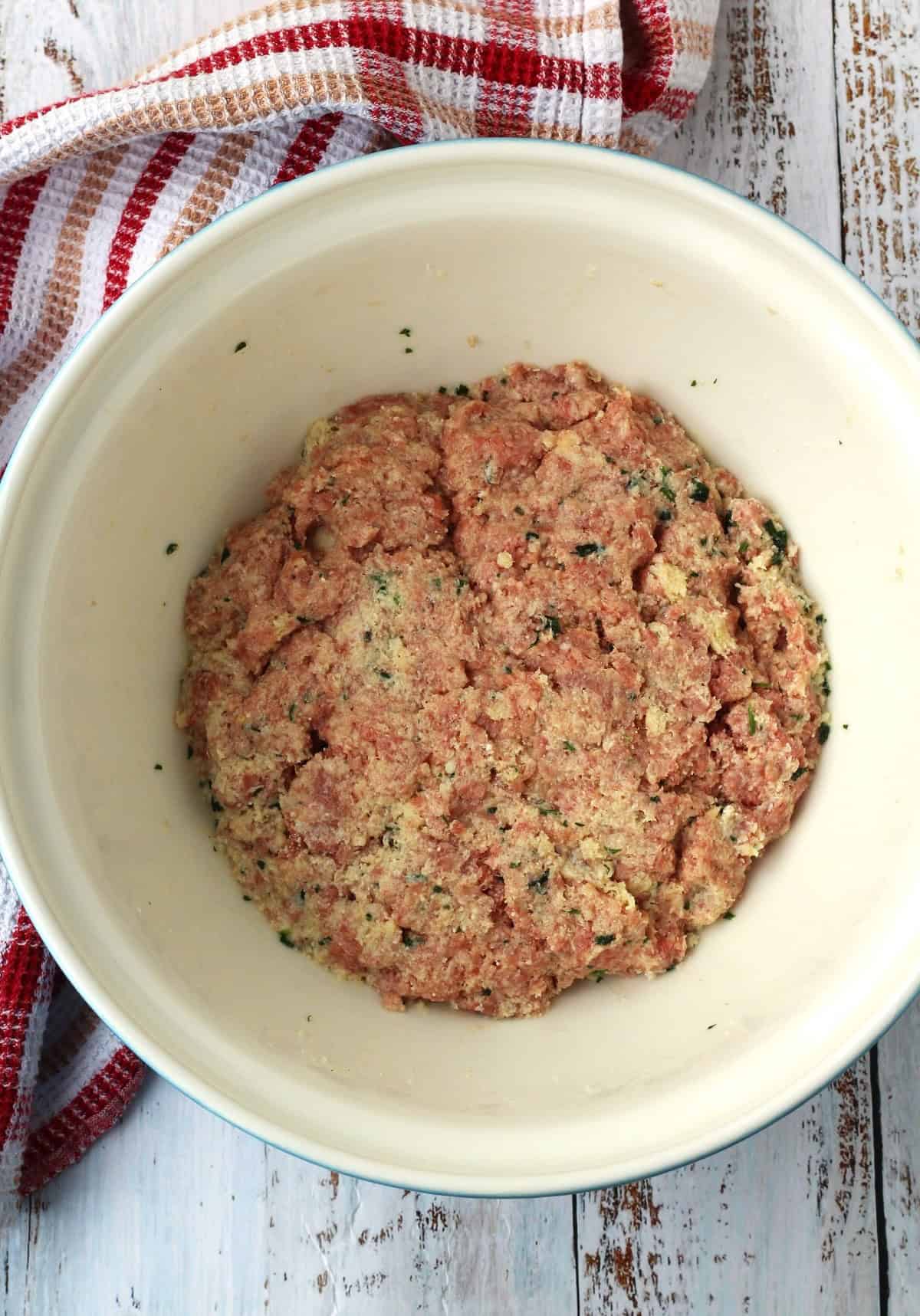 Mixture for Sicilian meatballs in bowl.