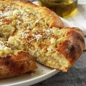 Pizza with cauliflower, crispy breadcrumbs and ricotta salata.