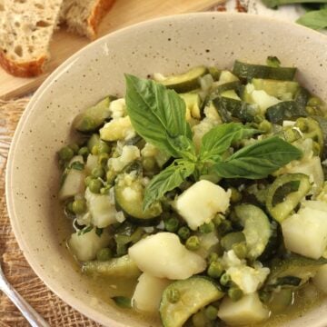 Stewed zucchini with potatoes and peas