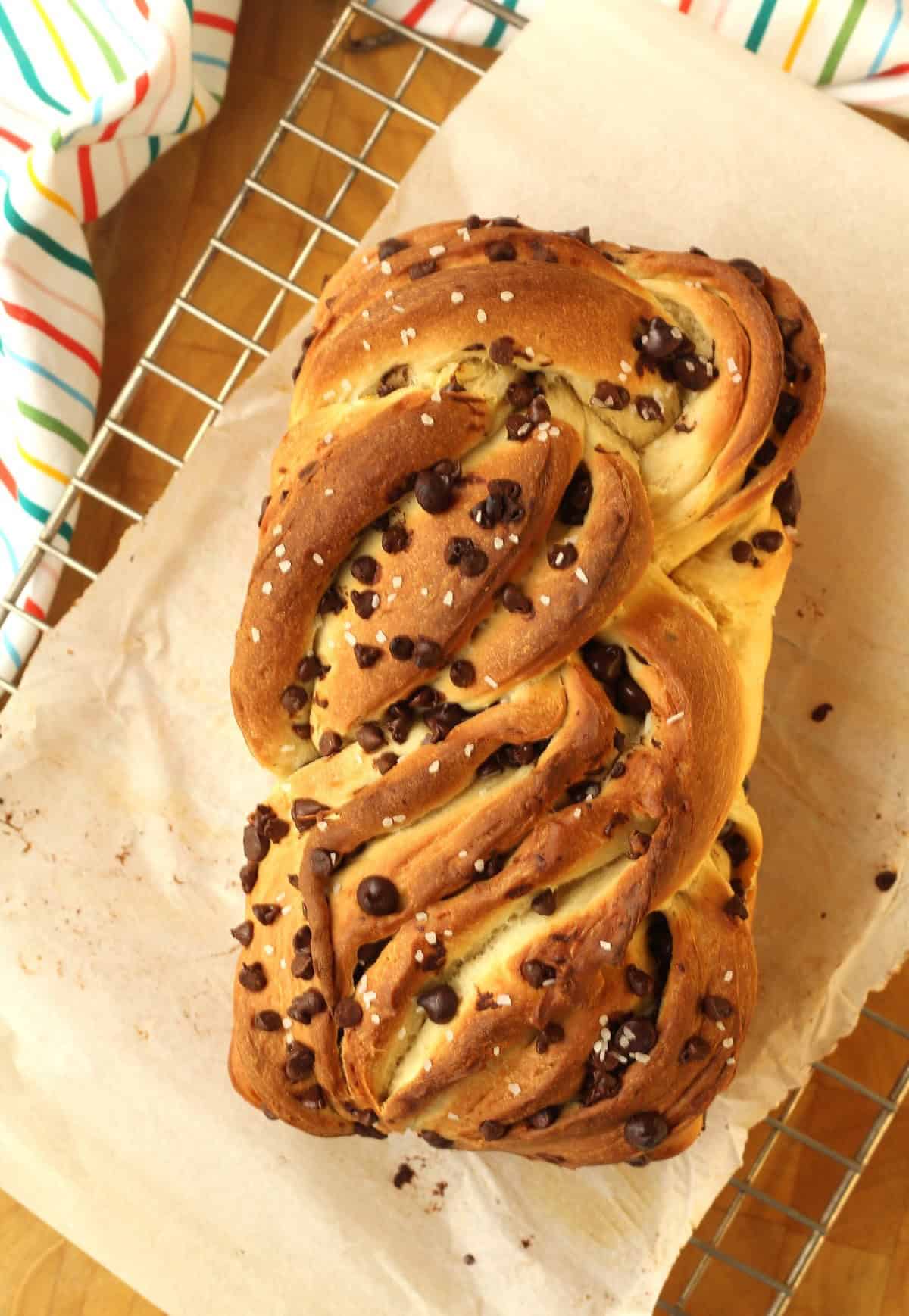 Just baked chocolate chip brioche bread on wire rack for cooling.
