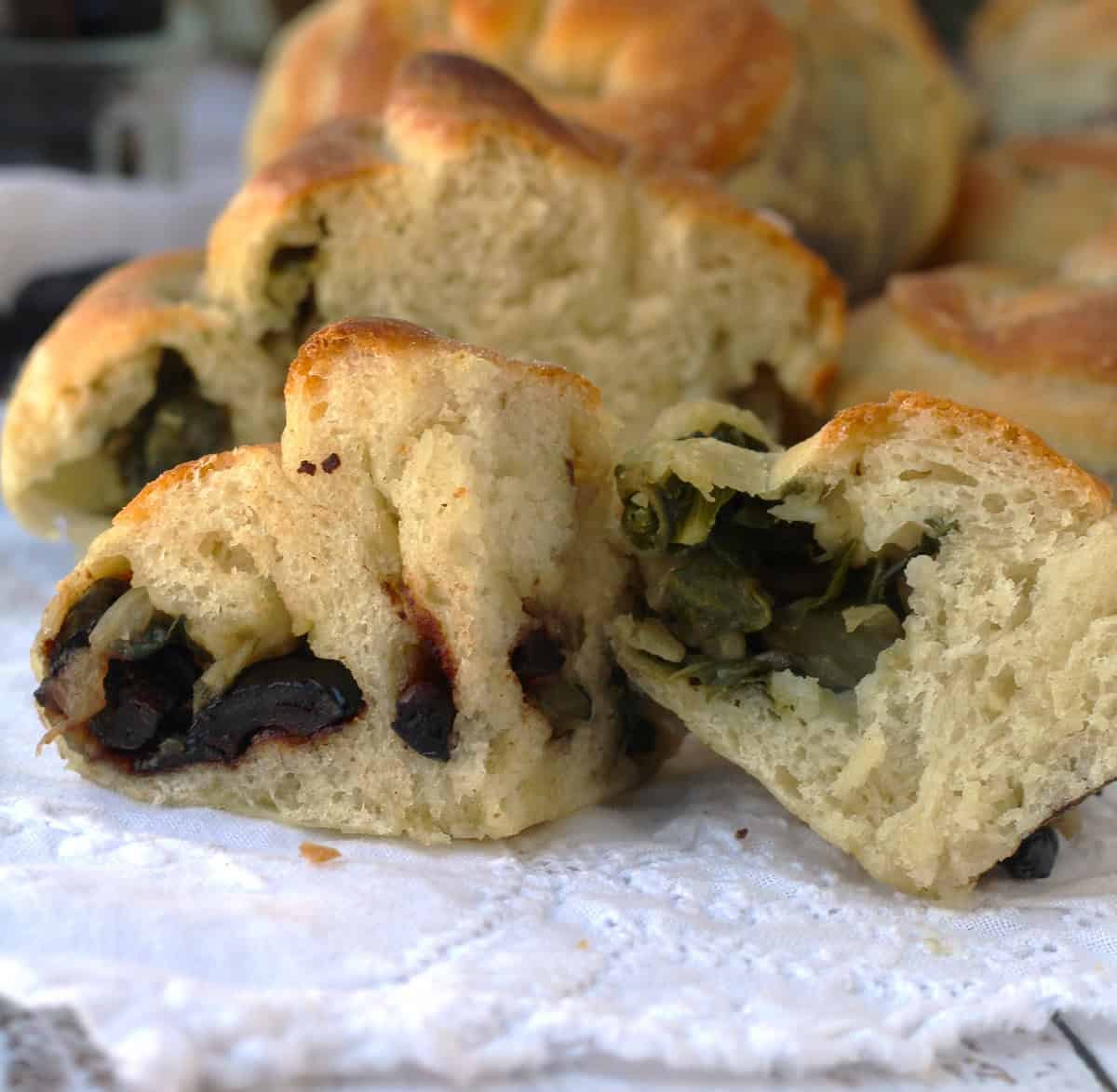 Swiss chard filled bignolati cut in half.