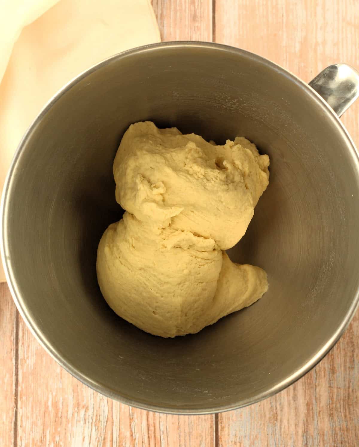 Cudduruni semolina dough in bowl of food processor.