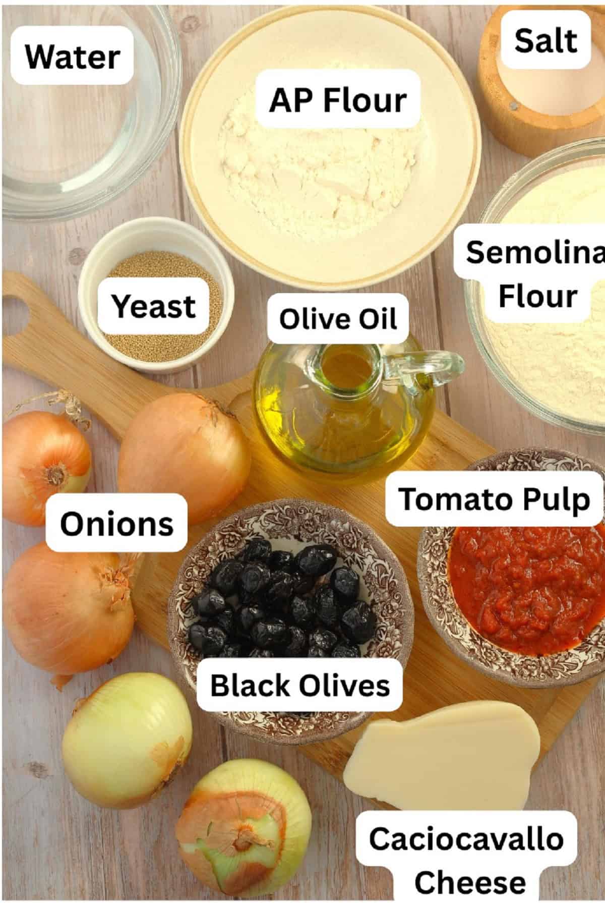 Flour, salt, semolina, tomato pulp, cheese, olives, onions, olive oil. yeast and water.