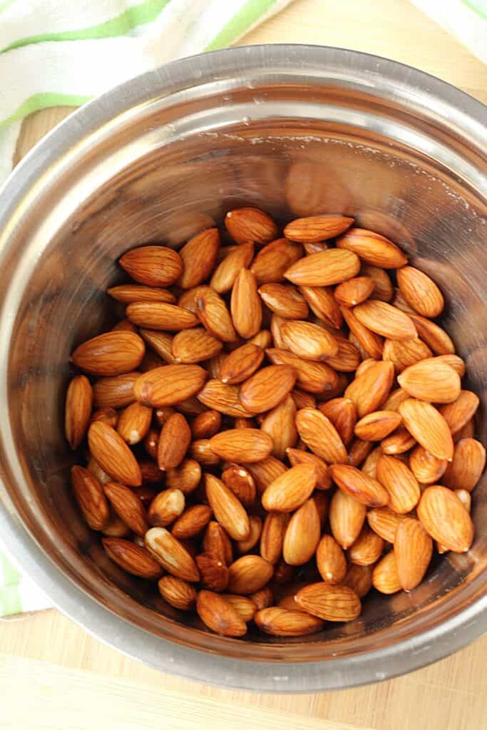 Almonds soaked in water overnight in bowl.