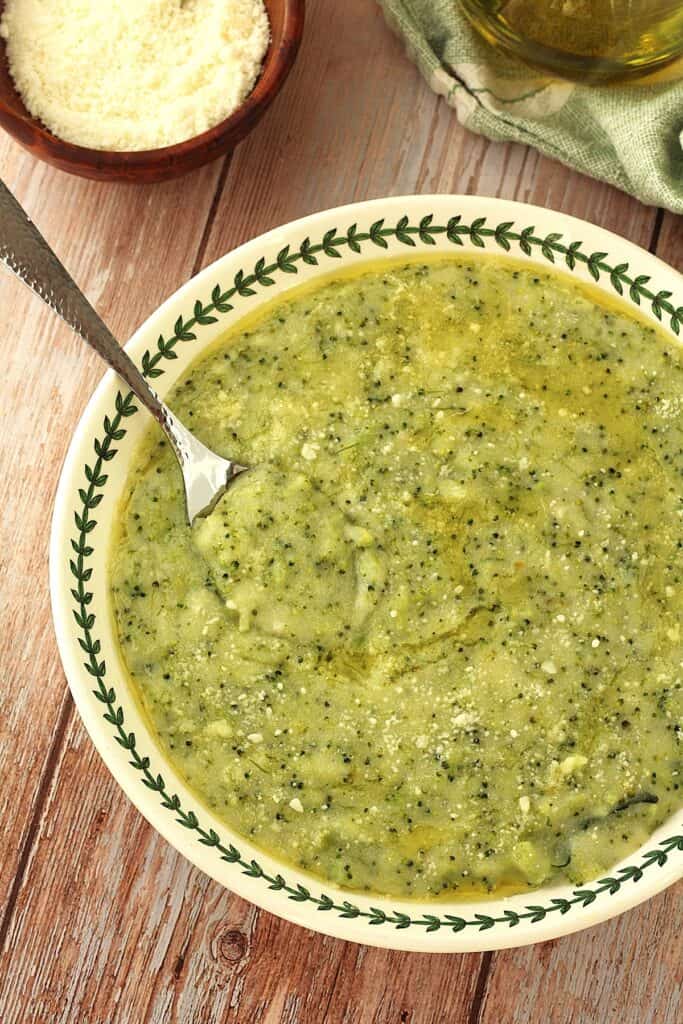 Frascatula (polenta with broccoli) plated with spoon in it.