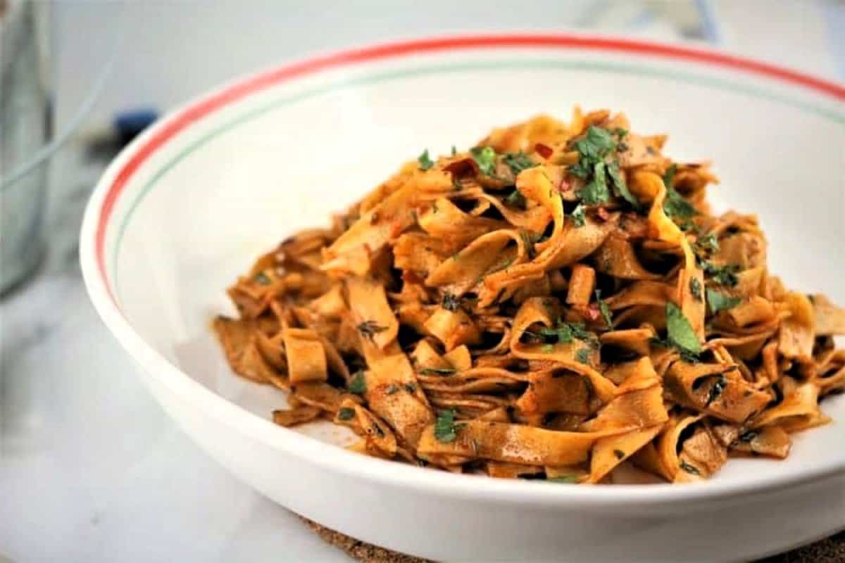 Chickpea Flour Tagliatelle with Garlic Paprika Sauce Bowl of chickpea flour tagliatelle in garlic paprika sauce.