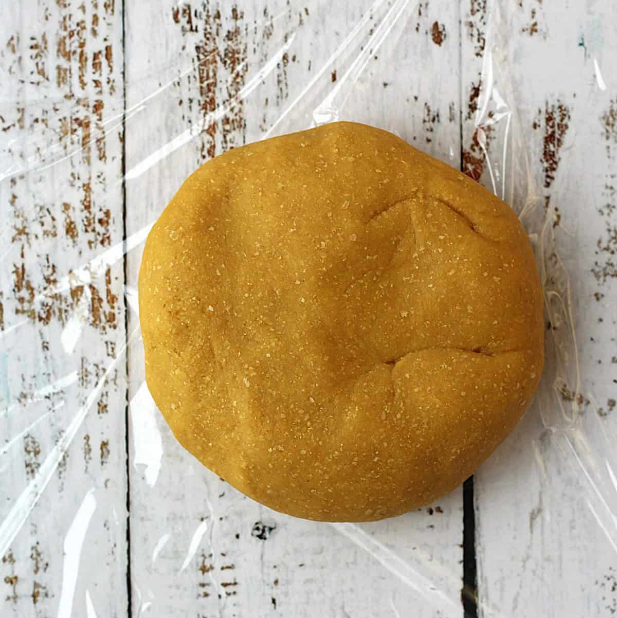 Disc shaped chickpea pasta dough.