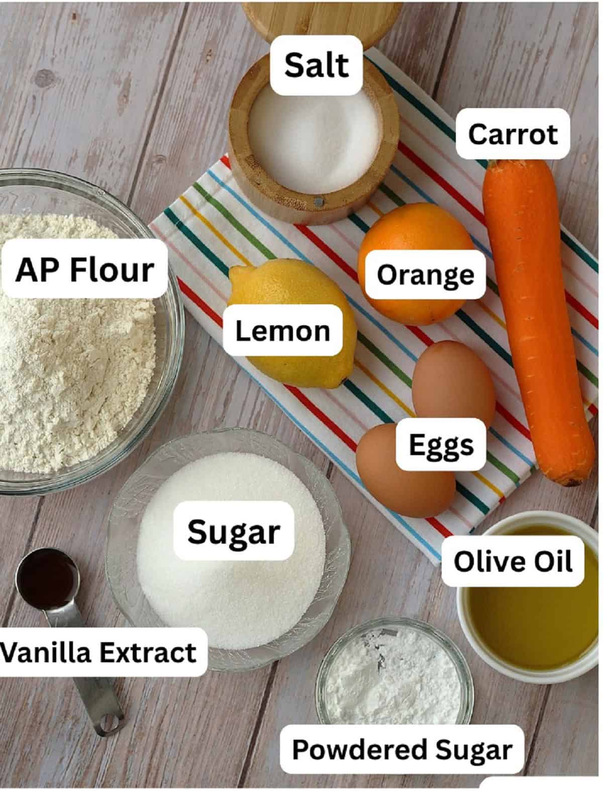 Carrot, orange, lemon, eggs, olive oil, sugar, vanilla, flour and salt.