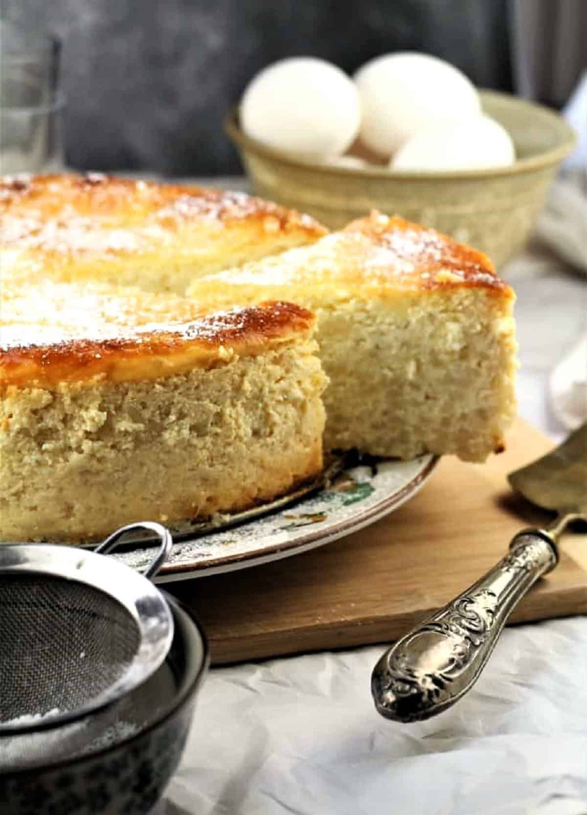 Easy No Crust Easter Pastiera Slice of pastiera (Easter rice and ricotta pie) cut from whole pastiera.