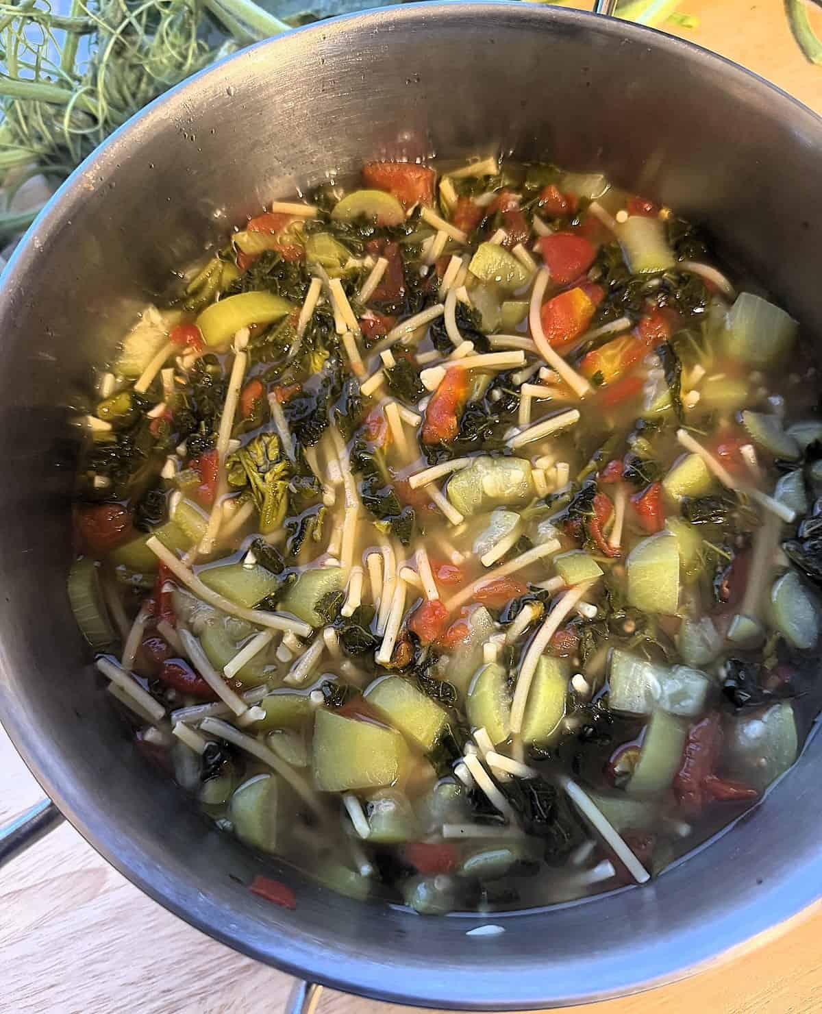 Sicilian pasta with tenerumi in large sauce pan.