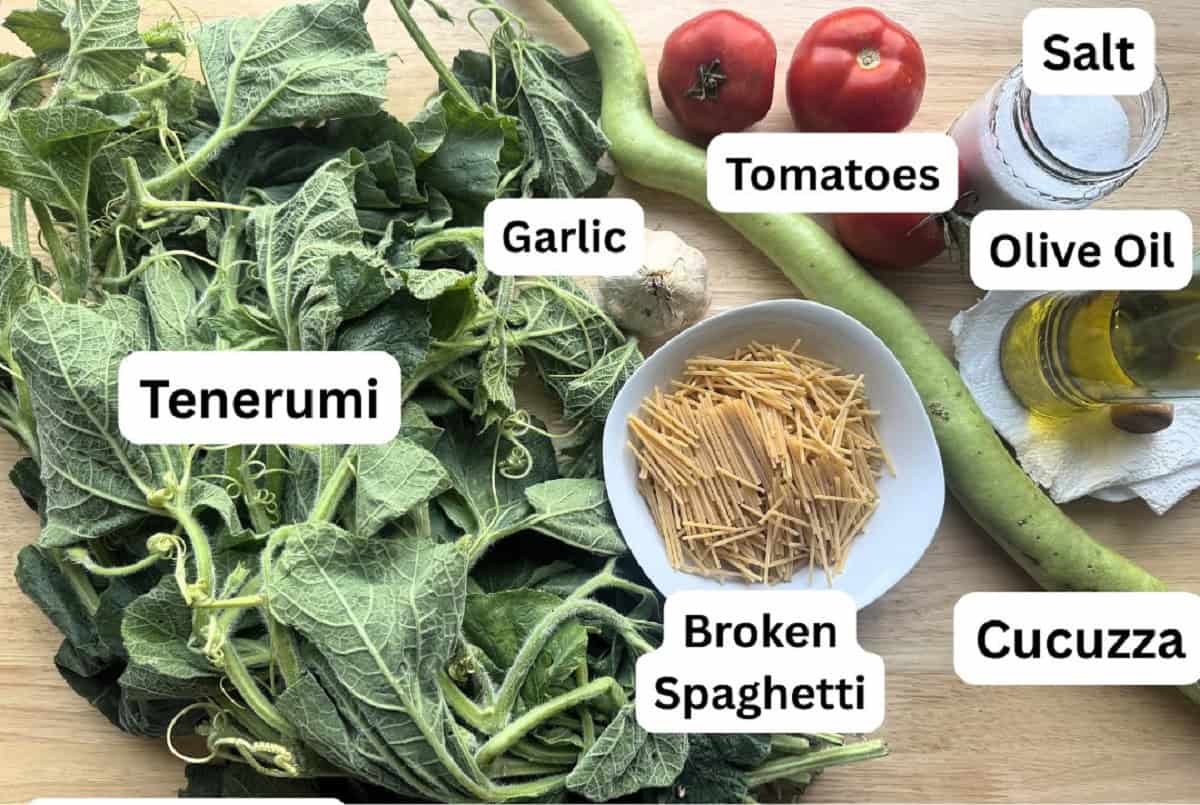 Tenerumi leaves, cucuzza squash, tomatoes, garlic, broken spaghetti, olive oil and salt.