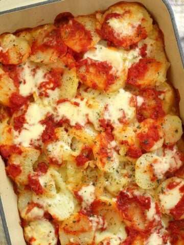 Patate alla pizzaiola casserole in casserole dish.